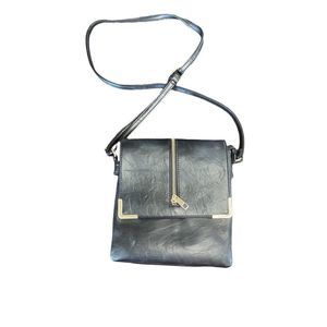 NOATD Black and Gold Leather Crossbody Bag with Zipper Detail.